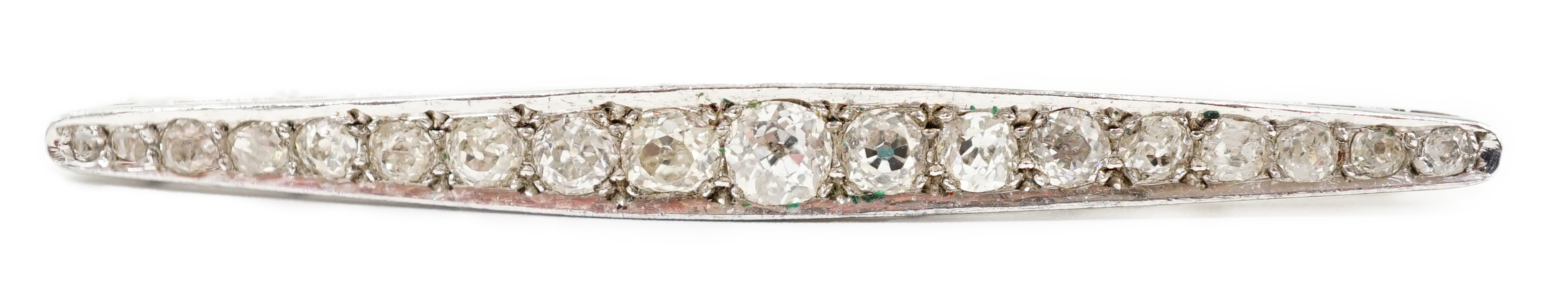 An early to mid 20th century platinum and graduated eighteen stone diamond set bar brooch